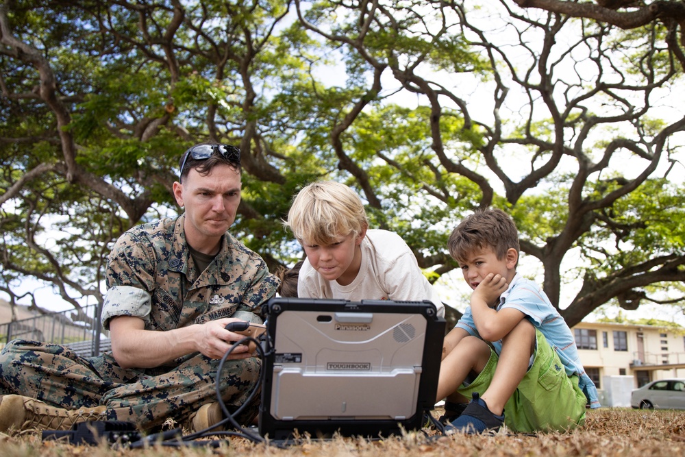 Armed with Knowledge: Military Homeschoolers of Hawaii receive military technology demonstration.