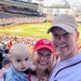 Lt. Nathan Henderson with wife Claire and newborn baby Everett at Nationals game