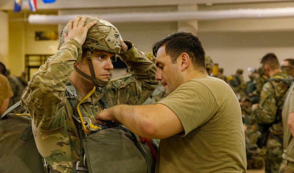 82nd Airborne Division Paratroopers conduct night jump during JRTC