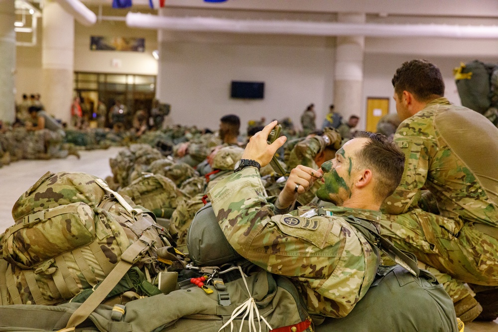 82nd Airborne Division Paratroopers conduct night jump during JRTC