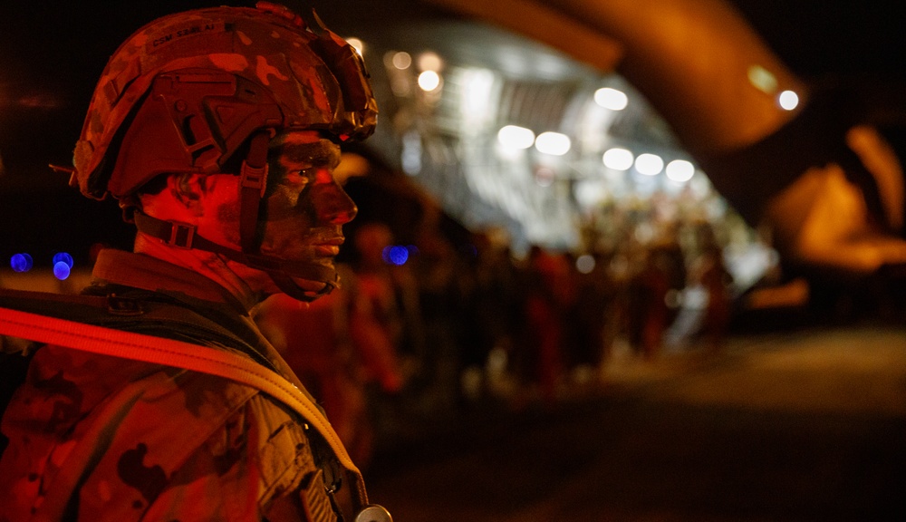 82nd Airborne Division Paratroopers conduct night jump during JRTC