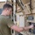 380 ECES Electrical Power Production performs generator maintenance