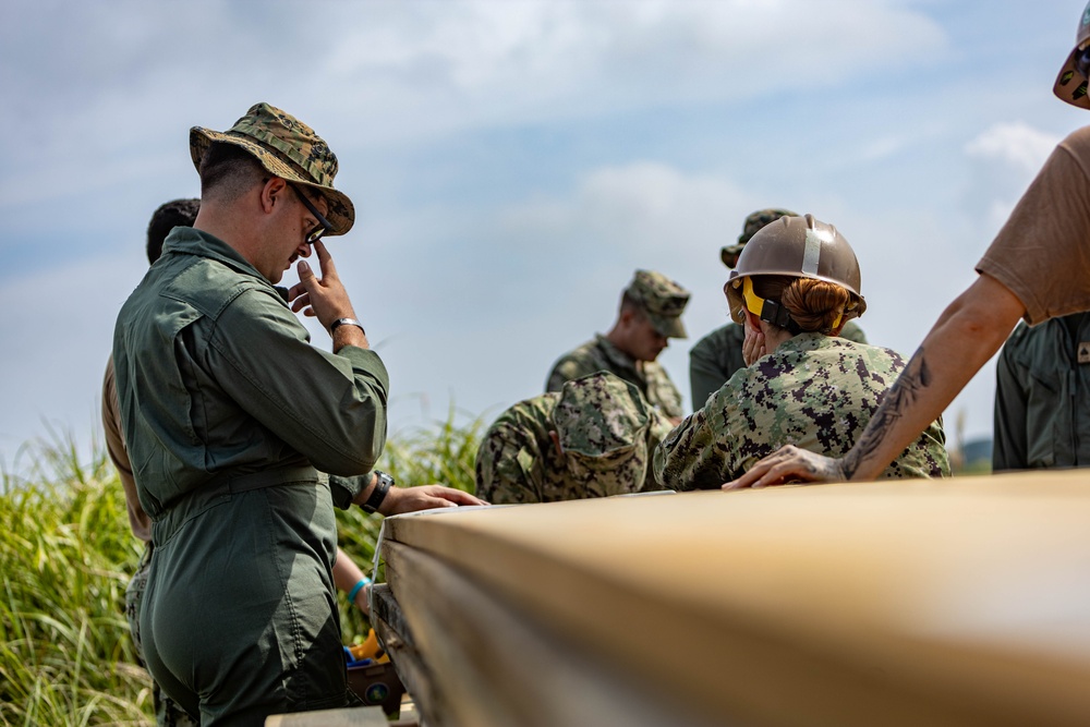 Planning for Success - Japan Ground Self-Defense Force, U.S. Marines, and Sailors prepare Kirishima Training Area for airfield damage repair training