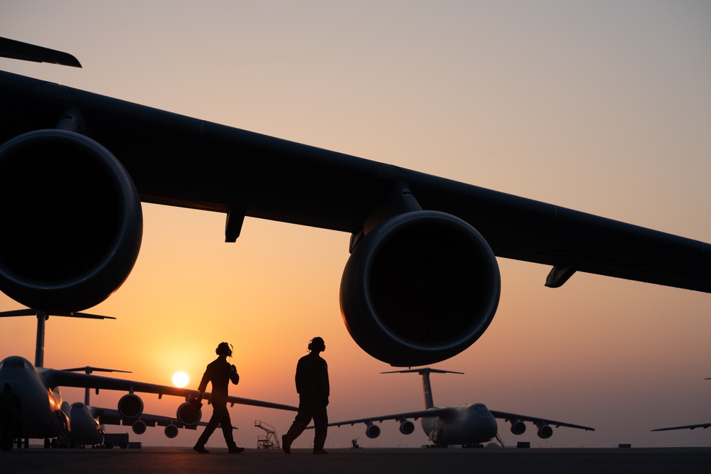 C-5M Super Galaxy aircrew and maintainers at Travis AFB