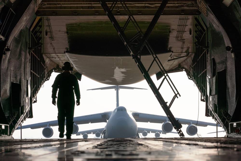 C-5M Super Galaxy aircrew and maintainers at Travis AFB