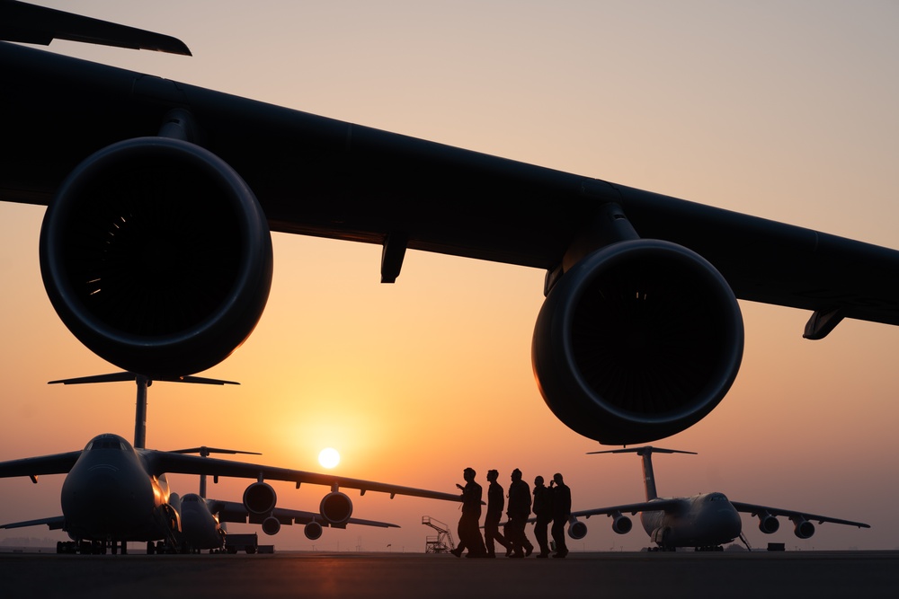 C-5M Super Galaxy aircrew and maintainers at Travis AFB