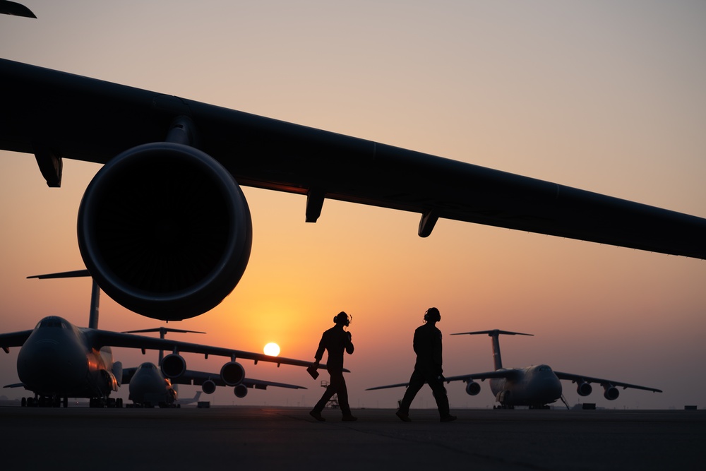 C-5M Super Galaxy aircrew and maintainers at Travis AFB