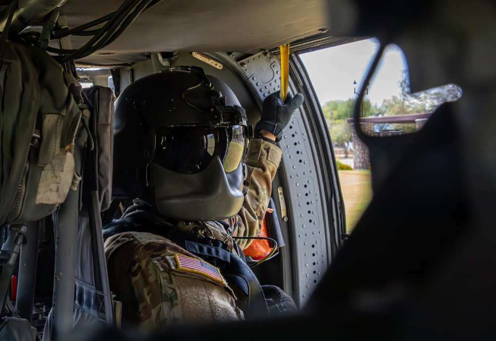 U.S. Army Crew Chief overlooks 1AD Headquarters