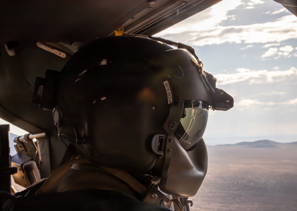 U.S. Army Crew Chief scans the horizon