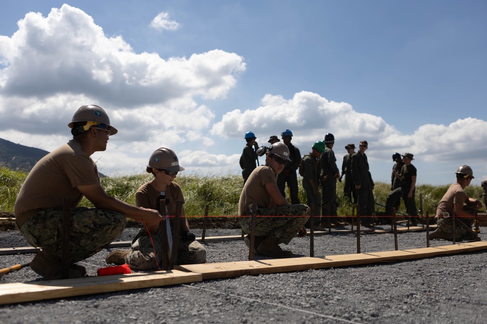 Dawn till Dusk - Japan Ground Self-Defense Force, U.S. Marines, and Sailors prepare Kirishima Training Area for airfield damage repair training