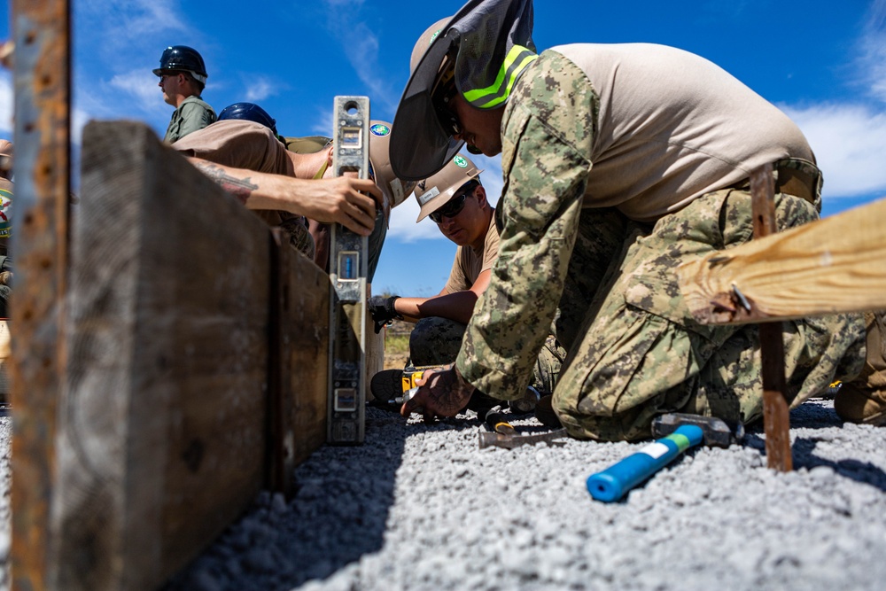 Dawn till Dusk - Japan Ground Self-Defense Force, U.S. Marines, and Sailors prepare Kirishima Training Area for airfield damage repair training