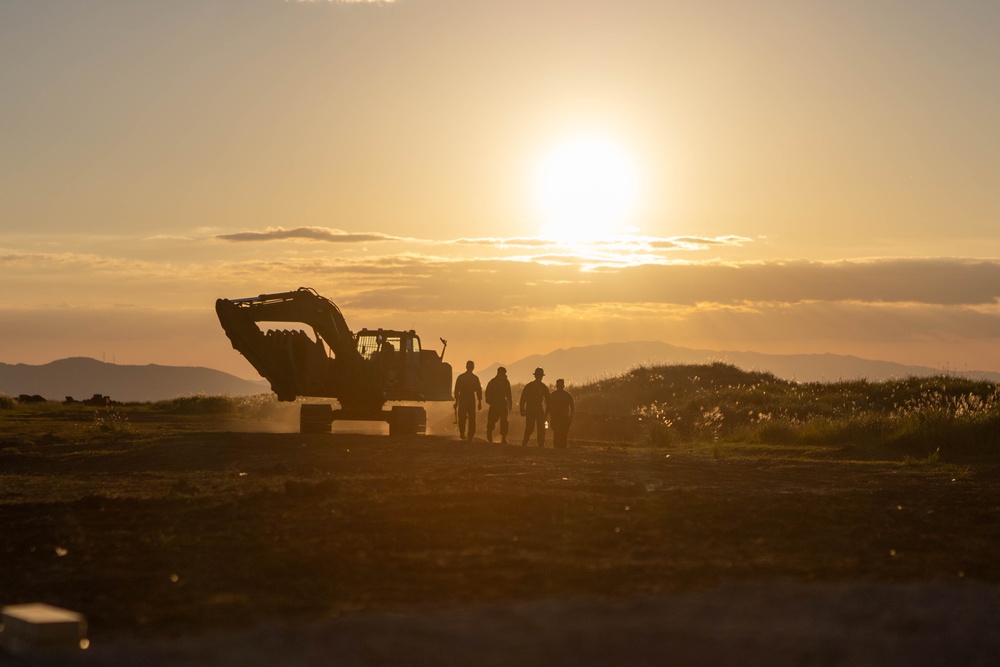 Dawn till Dusk - Japan Ground Self-Defense Force, U.S. Marines, and Sailors prepare Kirishima Training Area for airfield damage repair training