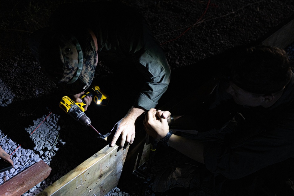 Dawn till Dusk - Japan Ground Self-Defense Force, U.S. Marines, and Sailors prepare Kirishima Training Area for airfield damage repair training