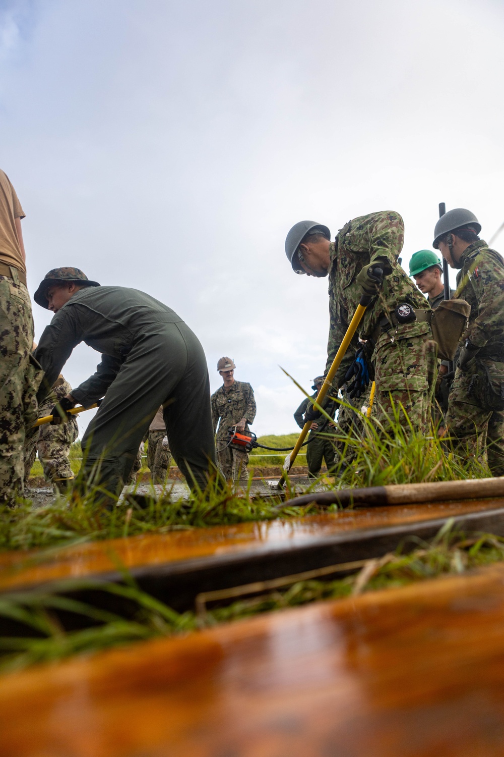 Cemented in Time - Japan Ground Self-Defense Force, U.S. Marines, and Sailors prepare Kirishima Training Area for airfield damage repair training