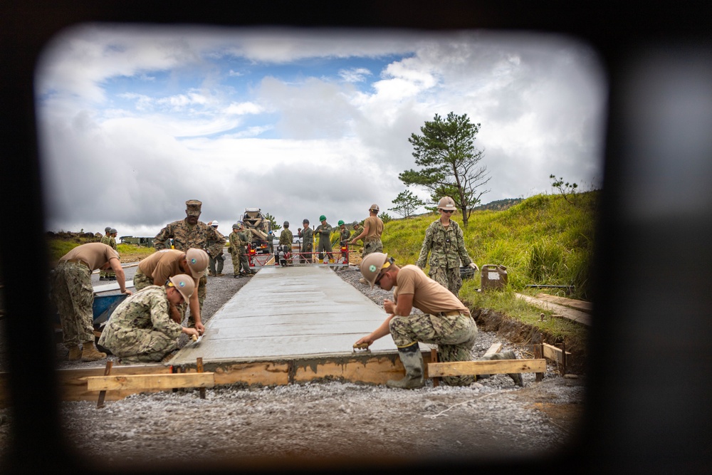 Cemented in Time - Japan Ground Self-Defense Force, U.S. Marines, and Sailors prepare Kirishima Training Area for airfield damage repair training