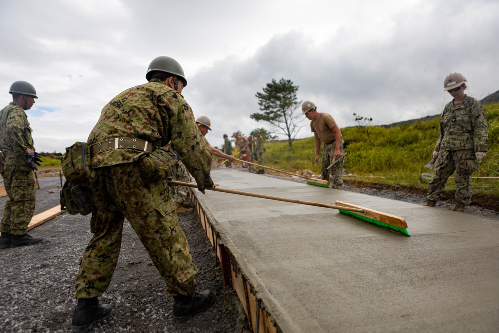 Cemented in Time - Japan Ground Self-Defense Force, U.S. Marines, and Sailors prepare Kirishima Training Area for airfield damage repair training