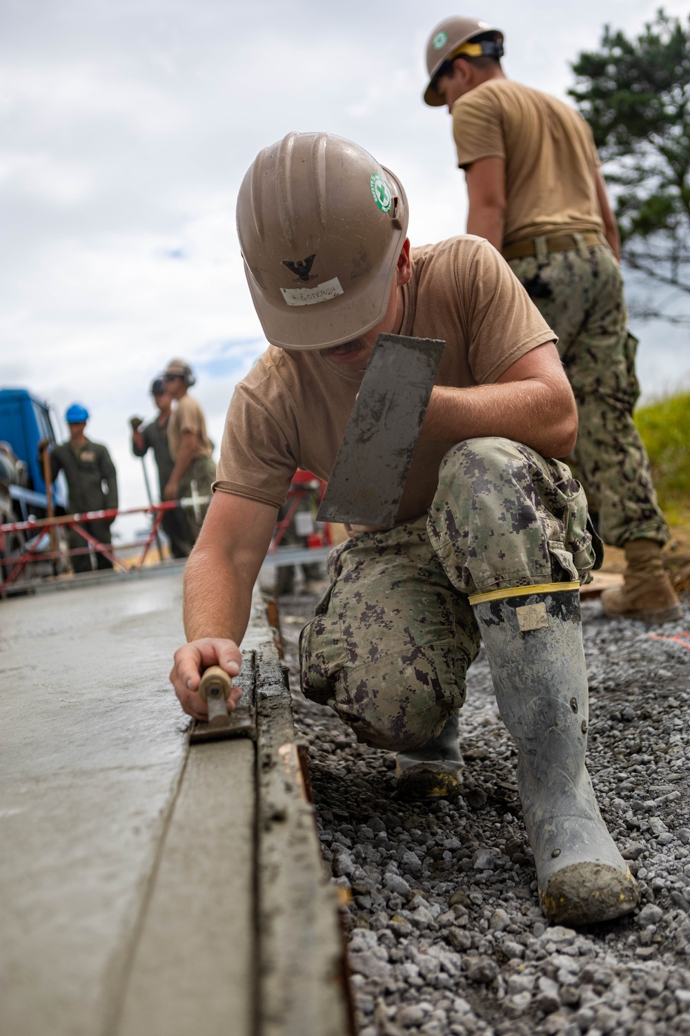 Cemented in Time - Japan Ground Self-Defense Force, U.S. Marines, and Sailors prepare Kirishima Training Area for airfield damage repair training