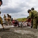 Cemented in Time - Japan Ground Self-Defense Force, U.S. Marines, and Sailors prepare Kirishima Training Area for airfield damage repair training