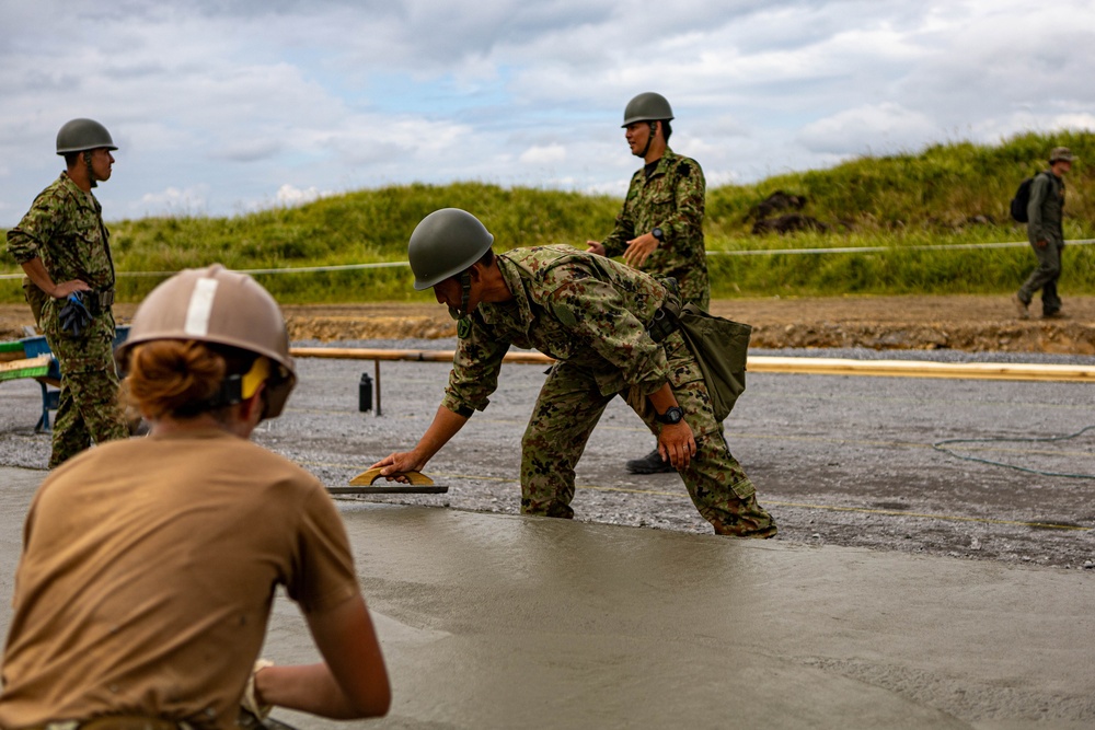 Cemented in Time - Japan Ground Self-Defense Force, U.S. Marines, and Sailors prepare Kirishima Training Area for airfield damage repair training