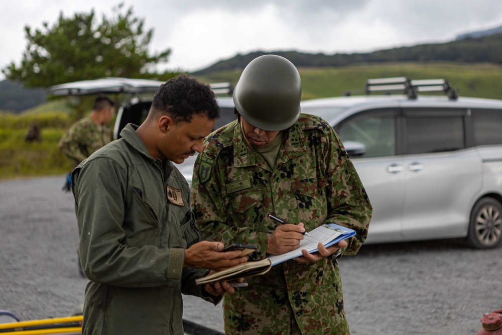 Cemented in Time - Japan Ground Self-Defense Force, U.S. Marines, and Sailors prepare Kirishima Training Area for airfield damage repair training