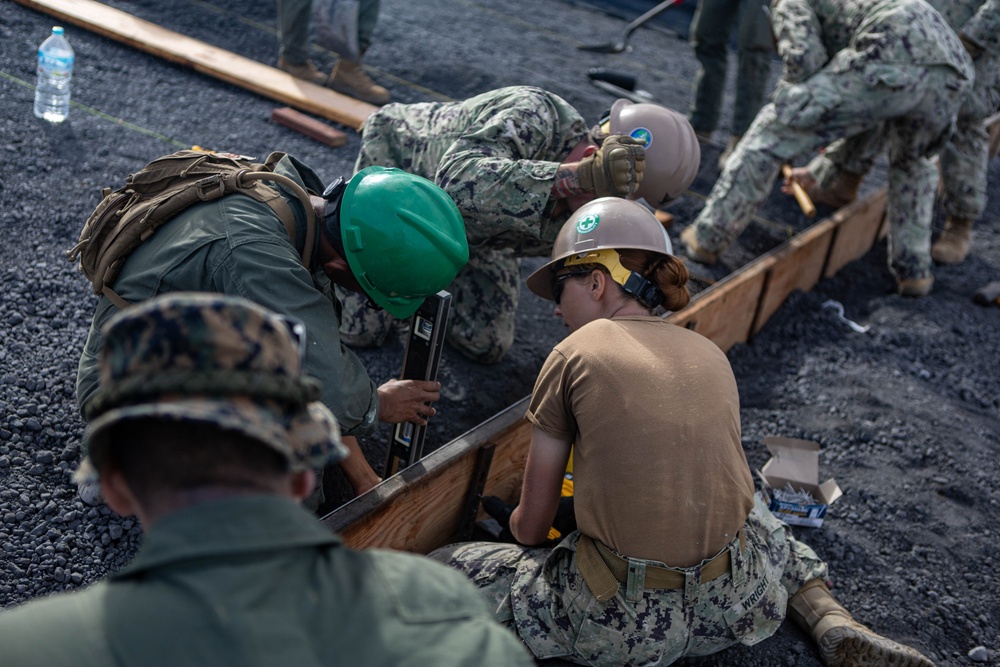 Better Together - Japan Ground Self-Defense Force, U.S. Marines, and Sailors prepare Kirishima Training Area for airfield damage repair training