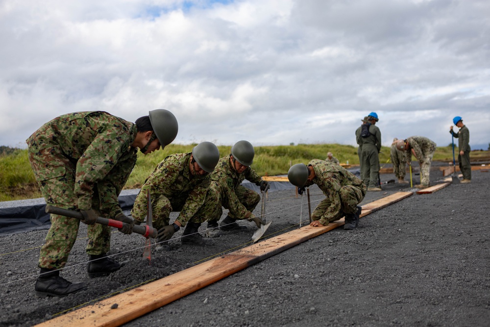 Better Together - Japan Ground Self-Defense Force, U.S. Marines, and Sailors prepare Kirishima Training Area for airfield damage repair training