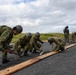 Better Together - Japan Ground Self-Defense Force, U.S. Marines, and Sailors prepare Kirishima Training Area for airfield damage repair training