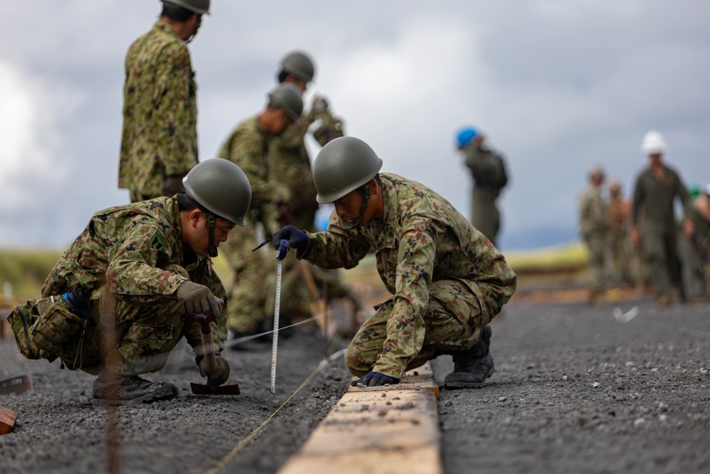 Better Together - Japan Ground Self-Defense Force, U.S. Marines, and Sailors prepare Kirishima Training Area for airfield damage repair training