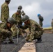 Better Together - Japan Ground Self-Defense Force, U.S. Marines, and Sailors prepare Kirishima Training Area for airfield damage repair training