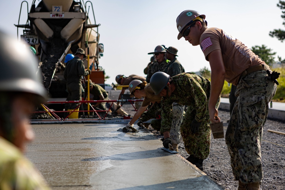 Moving Parts - Japan Ground Self-Defense Force, U.S. Marines, and Sailors prepare Kirishima Training Area for airfield damage repair training