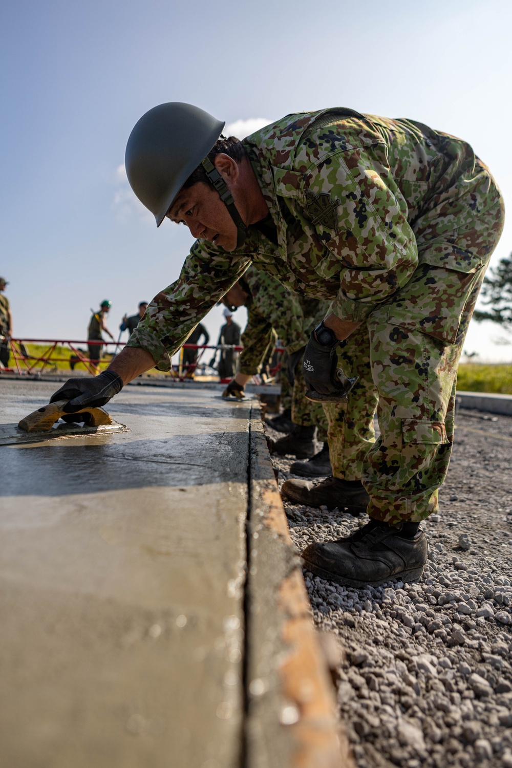 Moving Parts - Japan Ground Self-Defense Force, U.S. Marines, and Sailors prepare Kirishima Training Area for airfield damage repair training