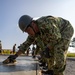 Moving Parts - Japan Ground Self-Defense Force, U.S. Marines, and Sailors prepare Kirishima Training Area for airfield damage repair training