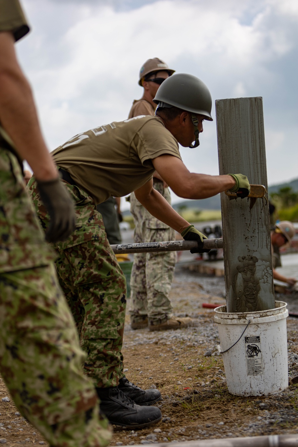 Moving Parts - Japan Ground Self-Defense Force, U.S. Marines, and Sailors prepare Kirishima Training Area for airfield damage repair training