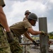 Moving Parts - Japan Ground Self-Defense Force, U.S. Marines, and Sailors prepare Kirishima Training Area for airfield damage repair training