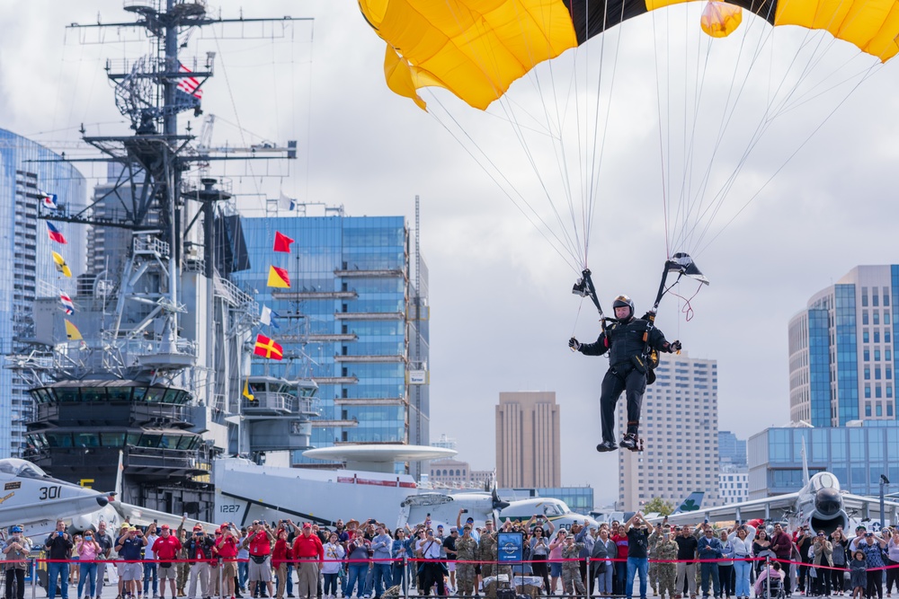 Soldiers from Army Golden Knights jump in San Diego onto U.S.S. Midway