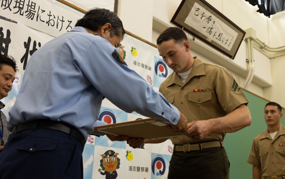 3d Marine Division Marines Awarded for Rendering First Aid to Okinawan Citizens