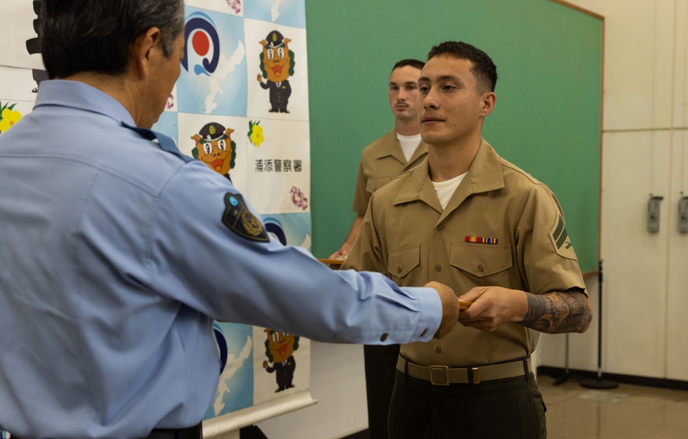 3d Marine Division Marines Awarded for Rendering First Aid to Okinawan Citizens