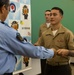 3d Marine Division Marines Awarded for Rendering First Aid to Okinawan Citizens