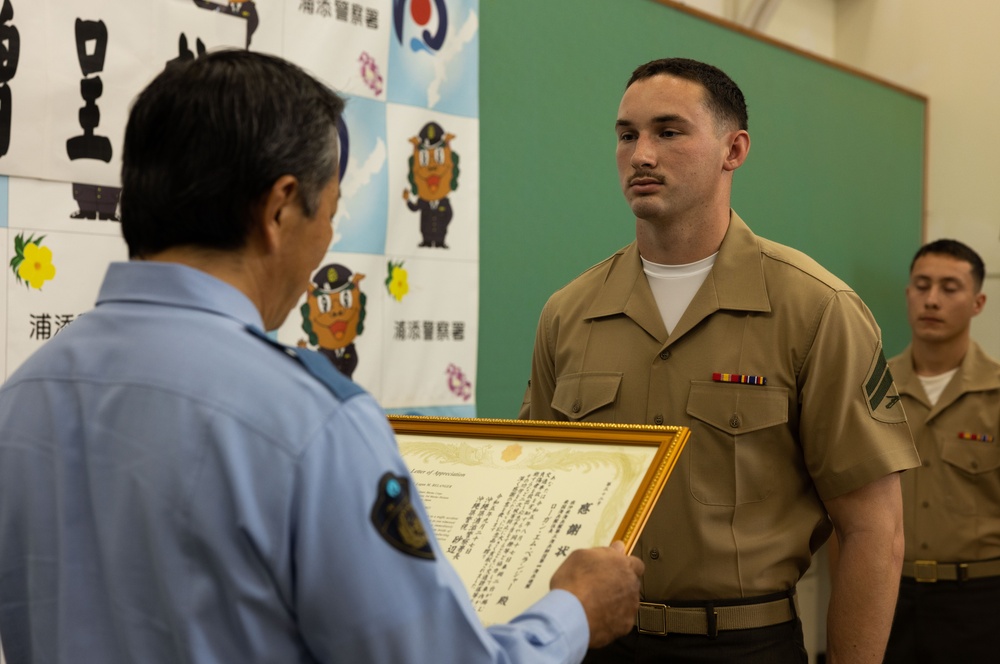 3d Marine Division Marines Awarded for Rendering First Aid to Okinawan Citizens