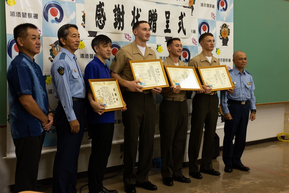 3d Marine Division Marines Awarded for Rendering First Aid to Okinawan Citizens