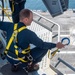 USS Ronald Reagan (CVN 76) Sailors conduct maintenance while working aloft