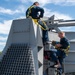 USS Ronald Reagan (CVN 76) Sailors conduct maintenance while working aloft