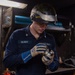 USS Ronald Reagan (CVN 76) Sailor braises piping