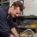 Ronald Reagan (CVN 76) Sailors repair self-contained breathing apparatus recharger