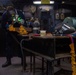 USS Ronald Reagan (CVN 76) Sailor braises piping