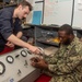 Ronald Reagan (CVN 76) Sailors repair self-contained breathing apparatus recharger