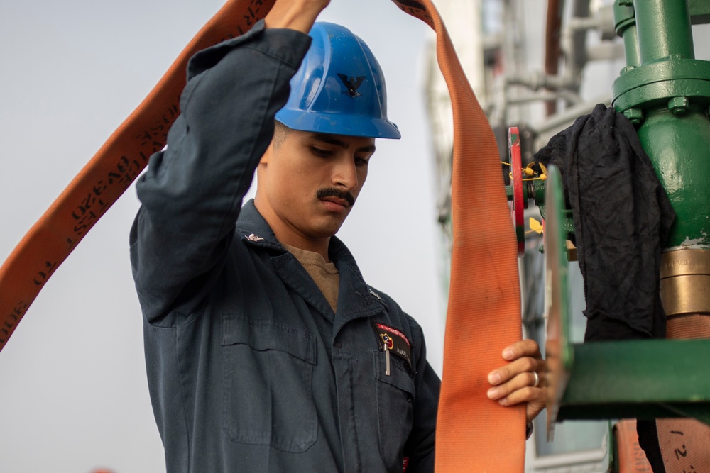 USS Tripoli Sailors Perform Flight Deck Maintenance