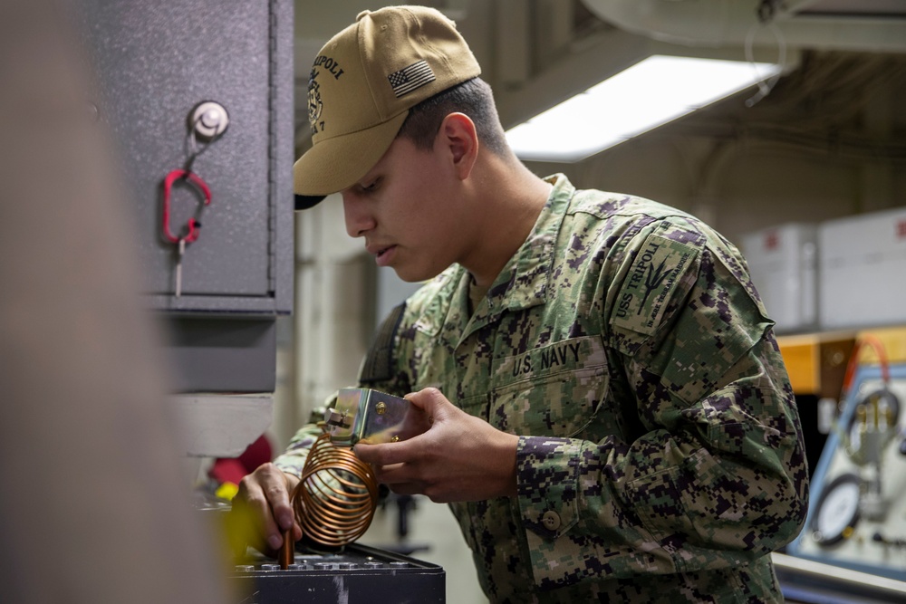 USS Tripoli Sailors Perform Calibration Tests