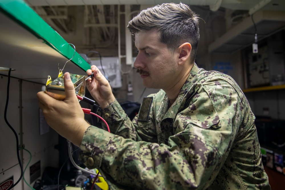 USS Tripoli Sailors Perform Calibration Tests