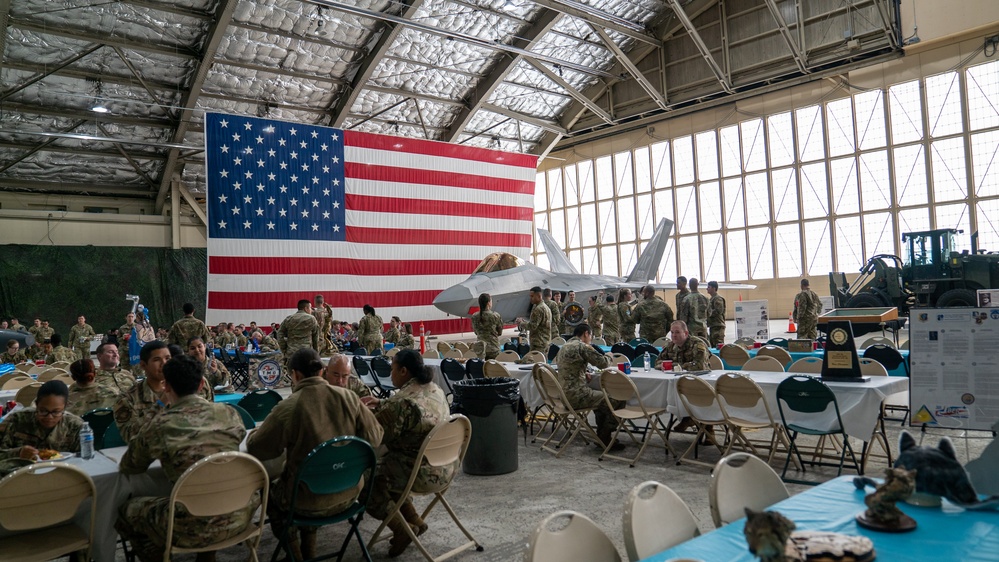 U.S. service members and their families celebrate the Air Force Bash at Hangar 3 at Joint Base Elmendorf-Richardson, Alaska, Sept. 22, 2023.